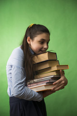 teen girl with stack of books