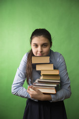teen girl with stack of books