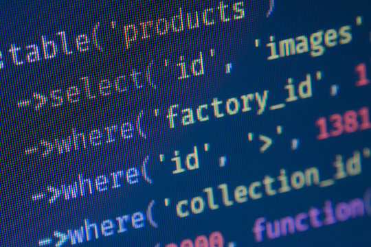 Php code on blue background close up, pixels
