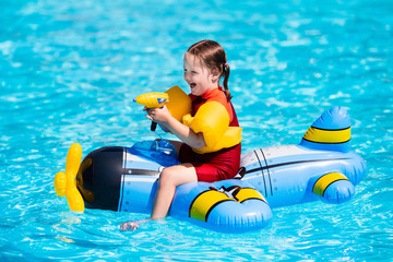 Little girl in swimming pool