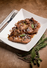 steak cooked on red wine and mixed herbs
