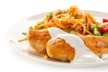 Fried chicken fillet, pasta and vegetables