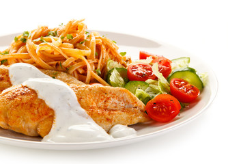 Fried chicken fillet, pasta and vegetables