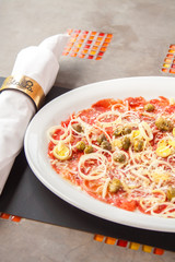 Salmon Carpaccio in a white plate