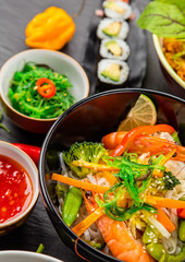 Asian food served on black stone