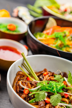 Asian food served on black stone
