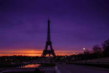 Awesome incredible pink-orange-lilac sunrise. View of the Eiffel Tower from the Trocadero. Beautiful morning cityscape. Paris. France.