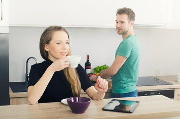 Young couple spends time together in the kitchen