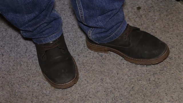 Man in jeans Taps Out a Beat