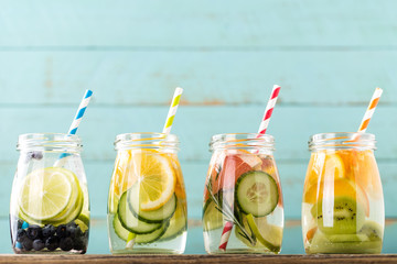 Variety of fruit infused detox water in jars for a healthy diet eating - 138510609