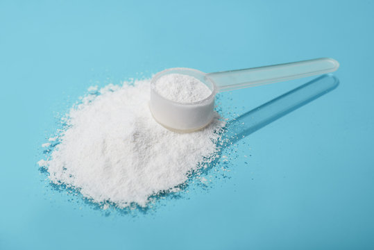 Sport supplement, creatine, hmb, bcaa, amino acid or vitamin mesure with powder. Sport nutrition concept.