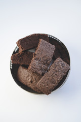 Chocolate brownies in a vintage silver bowl