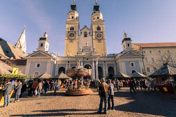 Naklejka na ściany i meble Traditional Christmas market in Duomo Square with scenic view of the Cathedral.