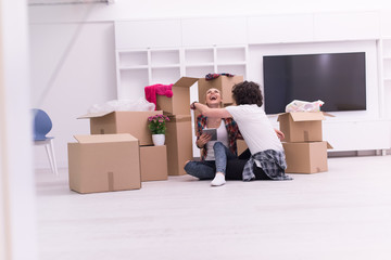 young couple moving  in new house