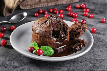 Fototapeta na wymiar Chocolate fondant with berries on plate