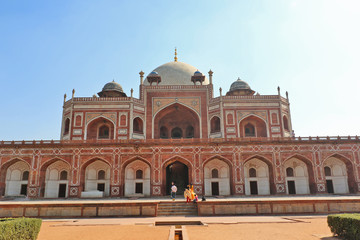Fototapeta na wymiar Mughal Emperor Humayun tomb was commissioned by his wife Bega Begum in 1569-70, designed by Persian architect Mirak Mirza. Many Mughal rulers lie buried here.