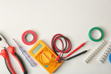 Different electrical tools on white background