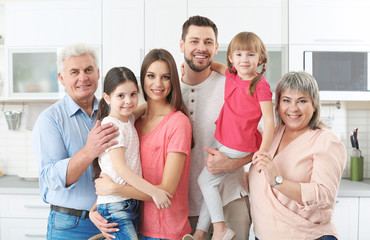 Happy family on kitchen at home