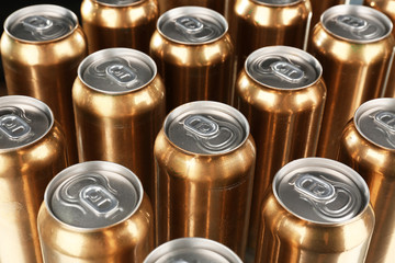 Cans of beer on table, closeup