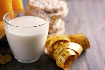Different dairy products on wooden background