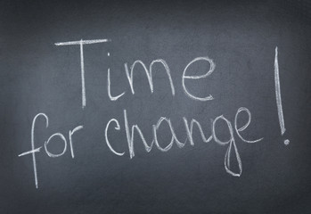 Phrase TIME FOR CHANGE on blackboard