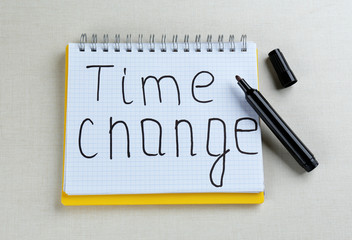 Phrase TIME CHANGE in notebook