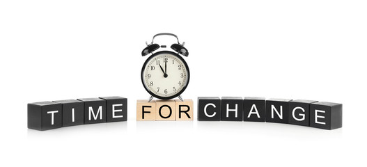 Wooden cubes with space for text and alarm clock on white background