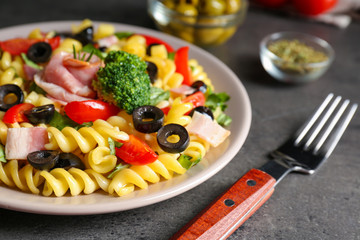 Cold pasta salad on table, closeup