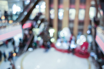 Interior of shopping mall at Christmas time, blurred background