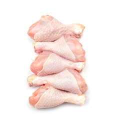 Raw chicken legs on white background