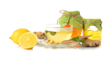 Natural medicine concept. Ginger honey tea with lemon and mint on white background