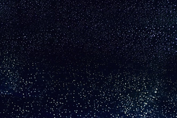 Rain drops on the window glass.