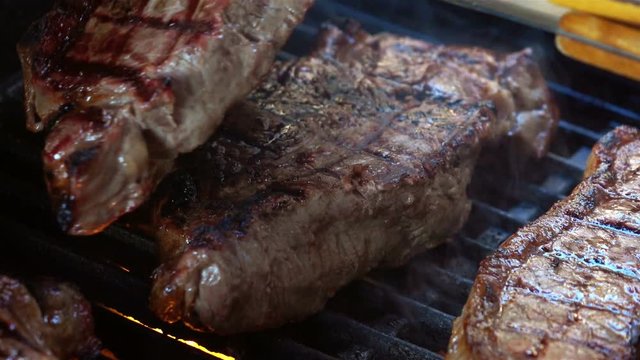  High quality video of grilling steaks on fire in real 1080p slow motion 120fps