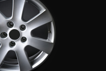 Obraz premium Car wheel on dark background