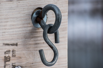 Metal hook on a bridge