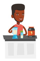 Young man making protein cocktail.