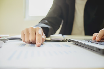 Fototapeta premium Asian Business woman discussion and analysis data at meeting