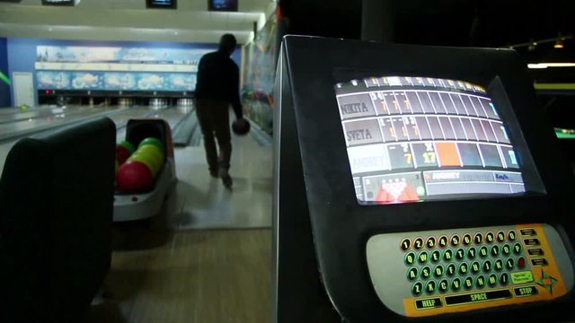 Bowling in an entertainment club. Information Board for the players.