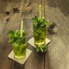 Mojito cocktails with mint leaves and lime