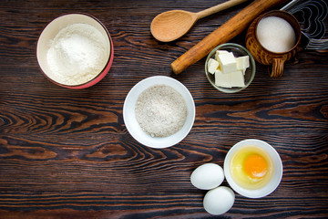 Baking ingredients for pastry on the wooden background