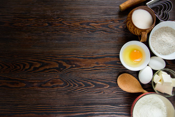 Baking ingredients for pastry on the wooden background