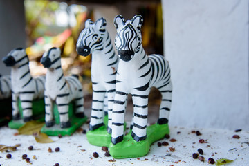 Small zebra statues for pray the god.