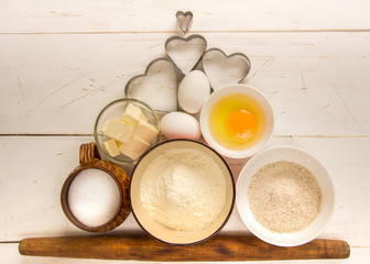 Baking ingredients for pastry on the wooden background