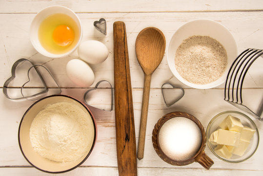 Baking ingredients for pastry on the wooden background