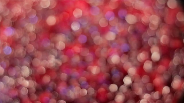 sparkling red and pink abstract blurred background 