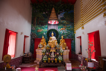 Golden Buddha at Poramai Yigawat Temple in Nonthaburi, Thailand.