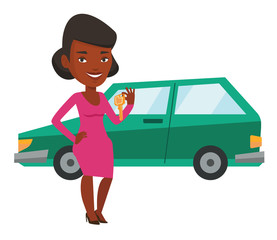 Woman holding keys to her new car.