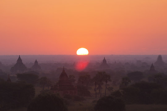 Mystical and foggy golden sunrise in Bagan, Myanmar 