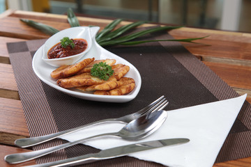 Fried banana snack with indonesian sambal