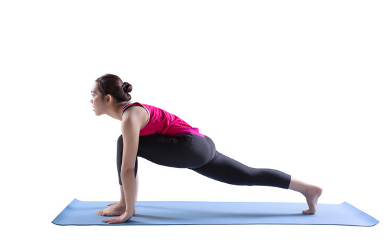 Sporty fit women practices yoga Anjaneyasana exercise bend yoga pose on rubber mat.